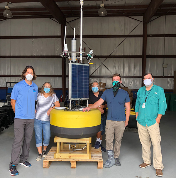 CURBY with NOAA CO-OPS staff members Robert Heitsenrether, Grace Gray, Warren Krug, Winston Hensley, and the Office of Response and Restoration’s Charlie Henry. 