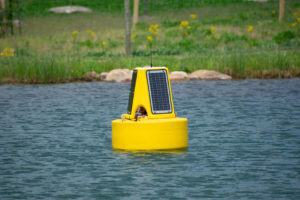 The NexSens XB-200 data buoy deployed on the Fondriest Field Station lake.