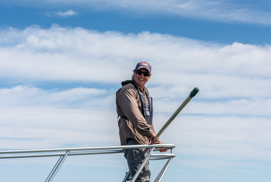 Greg Skomal on the pulpit of the shark tagging vessel Aleutian Dream.