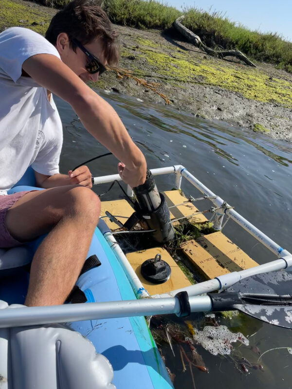 Installing the Manta sonde into the buoy housing in the Tijuana Estuary