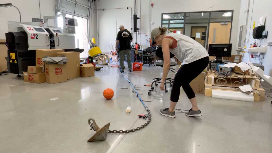 Cable-ties fly as Dr. Val Klump (left) and Jessie Grow (right) put the finishing touches on the mooring line and dissolved oxygen cable for one of the NexSens CB-150 systems prior to deployment. 