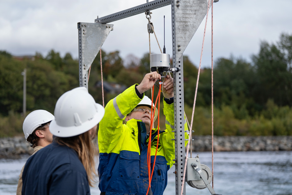 Sequoia team members installing the NexSens X3 datalogger to enable remote monitoring of sensor outputs.